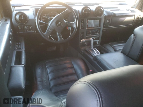 2007 Hummer H2 SUV z VIN 5GRGN23U07H104802, wystawiony jako Copart lot #41957875 z przebiegiem 161 755 mil mil oraz Szkoda całkowita • Salvage title. Historia ofert i sprzedaży dostępna na DreamBid. Obrazek 8.