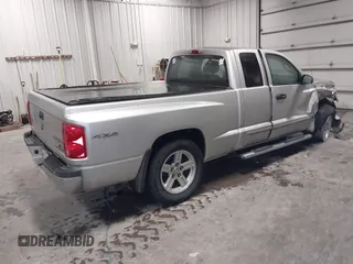 2010 Dodge Dakota with VIN 1D7CW3BP7AS103645, listed as a IAAI auction lot 41514841 with 158,125 mi miles and . Bid and sale history available at DreamBid. Image 4.