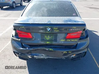 2018 BMW 5 Series M550i xDrive with VIN WBAJB9C51JB049513, listed as a IAAI auction lot 41146990 with 51,218 mi miles. Bid and sale history available at carsss.com. Image 6.