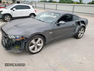 2018 Ford Mustang GT z VIN 1FA6P8CF9J5180464, wystawiony jako Copart lot #56682105 z przebiegiem 69 911 mil mil oraz Szkoda całkowita • Salvage title. Historia ofert i sprzedaży dostępna na DreamBid. Obrazek 1.