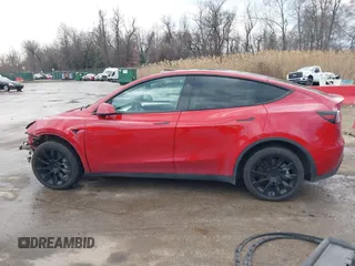 2023 Tesla Model Y Long Range with VIN 7SAYGDEE1PA169031, listed as a IAAI auction lot 41660766 with 35,253 mi miles and . Bid and sale history available at DreamBid. Image 15.