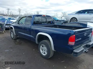 2004 Dodge Dakota SLT with VIN 1D7HG42N44S519910, listed as a IAAI auction lot 41737881 with 154,008 mi miles. Bid and sale history available at carsss.com. Image 3.