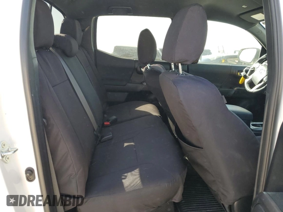 2021 Toyota Tacoma SR z VIN 3TMCZ5AN8MM387166, wystawiony jako Copart lot #49952935 z przebiegiem 63 175 mil mil oraz Szkoda całkowita • Salvage title. Historia ofert i sprzedaży dostępna na DreamBid. Obrazek 10.