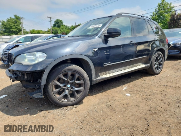 2012 BMW X5 35i with VIN 5UXZV4C5XCL765757, listed as a Copart auction lot 64497535 with 178,836 mi miles and Salvage title. Bid and sale history available at DreamBid. Image 1.