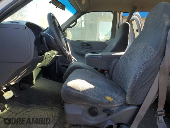 1999 Ford F-150 XL с VIN 1FTRX08L3XKB18916, выставлен на аукционе Copart как лот 81892064 с пробегом 175 280 миль миль и Списание • Salvage title. История ставок и продаж доступна на DreamBid. Изображение 7.