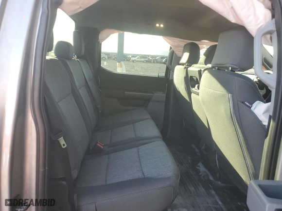 2024 Ford F-150 XL with VIN 1FTFW1L51RKD07071, listed as a Copart auction lot 76510574 with 965 mi miles and Salvage Title. Bid and sale history available at carsss.com. Image 10.