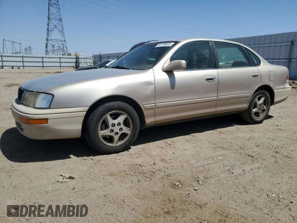 1997 Toyota Avalon XL with VIN 4T1BF12B0VU187179, listed as a Copart auction lot 54708565 with 336,922 mi miles and Salvage Title. Bid and sale history available at DreamBid. Image 1.