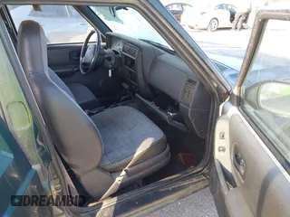 1999 Jeep Cherokee Sport with VIN 1J4FF68SXXL677013, listed as a IAAI auction lot 41993355 with 228,722 mi miles. Bid and sale history available at carsss.com. Image 5.