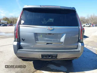2018 Cadillac Escalade Luxury z VIN 1GYS3BKJ0JR147752, wystawiony jako IAAI lot #41419140 z przebiegiem 124 376 mil mil oraz . Historia ofert i sprzedaży dostępna na DreamBid. Obrazek 17.