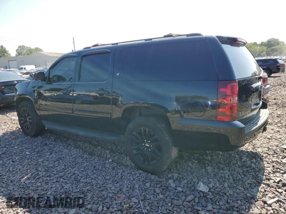 2014 Chevrolet Suburban LT with VIN 1GNSKJE72ER131763, listed as a Copart auction lot 69026754 with 186,248 mi miles and Salvage Title. Bid and sale history available at carsss.com. Image 2.