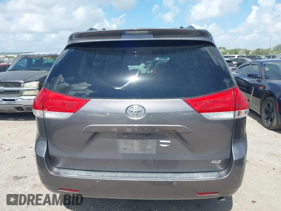 2014 Toyota Sienna XLE with VIN 5TDYK3DC0ES513076, listed as a IAAI auction lot 42724629 with 154,019 mi miles and . Bid and sale history available at DreamBid. Image 16.