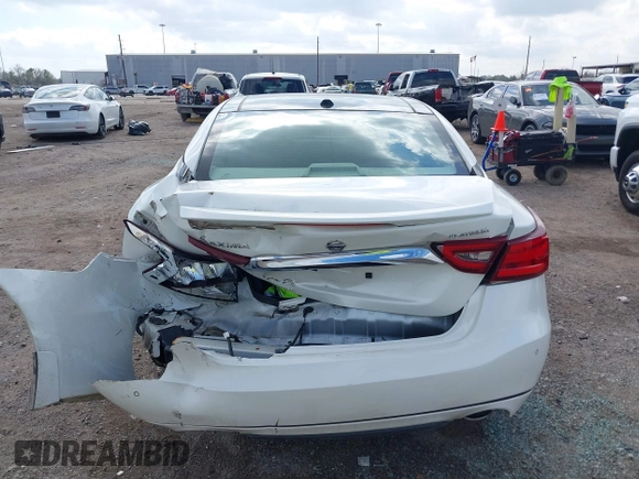 2016 Nissan Maxima SL z VIN 1N4AA6AP8GC403657, wystawiony jako IAAI lot #41506188 z przebiegiem 97 935 mil mil oraz . Historia ofert i sprzedaży dostępna na DreamBid. Obrazek 16.