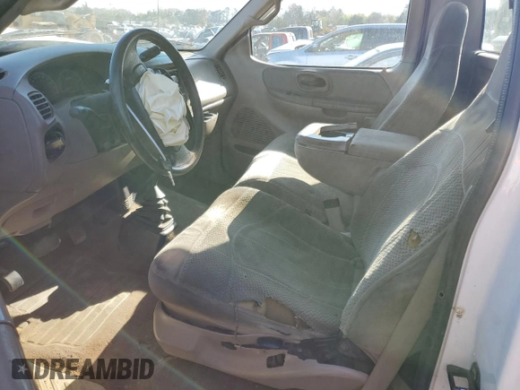 2000 Ford F-150 XL with VIN 1FTRF18W0YNB59622, listed as a Copart auction lot 50178485 with 264,057 mi miles and Salvage title. Bid and sale history available at DreamBid. Image 7.