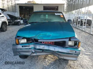 1995 GMC Jimmy SLS Base with VIN 1GKCS18WXS2519056, listed as a Copart auction lot 79313514 with 161,002 mi miles and Salvage Title. Bid and sale history available at carsss.com. Image 5.