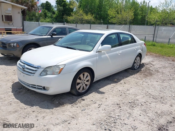 2005 Toyota Avalon XL with VIN 4T1BK36B65U045629, listed as a IAAI auction lot 42093132 with 133,157 mi miles. Bid and sale history available at carsss.com. Image 2.