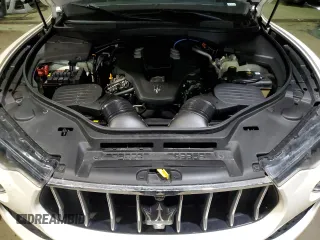 2021 Maserati Levante z VIN ZN661XUA5MX370925, wystawiony jako Copart lot #43057965 z przebiegiem 29 467 mil mil oraz Szkoda całkowita • Salvage title. Historia ofert i sprzedaży dostępna na DreamBid. Obrazek 12.