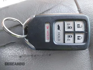 2015 Honda Odyssey EX-L with VIN 5FNRL5H67FB130663, listed as a IAAI auction lot 41988034 with 180,254 mi miles and . Bid and sale history available at carsss.com. Image 11.