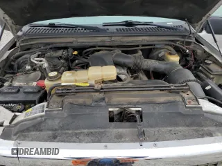 2002 Ford Excursion XLT with VIN 1FMNU41S22EC86209, listed as a Copart auction lot 51261065 with 202,942 mi miles and Salvage title. Bid and sale history available at DreamBid. Image 12.