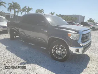 2014 Toyota Tundra SR5 z VIN 5TFDW5F19EX376160, wystawiony jako Copart lot #55012555 z przebiegiem 166 708 mil mil oraz Nie do naprawy • Non repairable. Historia ofert i sprzedaży dostępna na DreamBid. Obrazek 4.