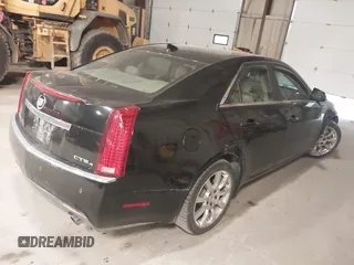 2009 Cadillac CTS AWD w/1SB with VIN 1G6DT57V290152885, listed as a IAAI auction lot 42063192 with 146,119 mi miles. Bid and sale history available at carsss.com. Image 4.