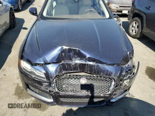 2016 Jaguar XF 35t Premium with VIN SAJBD4BV0GCY21512, listed as a Copart auction lot 66726984 with 129,346 mi miles and Salvage Title. Bid and sale history available at carsss.com. Image 11.