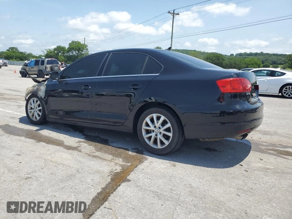 2014 Volkswagen Jetta SE z VIN 3VWD07AJ4EM445862, wystawiony jako Copart lot #61411995 z przebiegiem Nie podano mil oraz Czysty tytuł • Clean title. Historia ofert i sprzedaży dostępna na DreamBid. Obrazek 2.