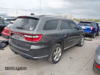 2014 Dodge Durango Limited z VIN 1C4RDJDG8EC597056, wystawiony jako IAAI lot #42116514 z przebiegiem 161 269 mil mil oraz . Historia ofert i sprzedaży dostępna na DreamBid. Obrazek 4.