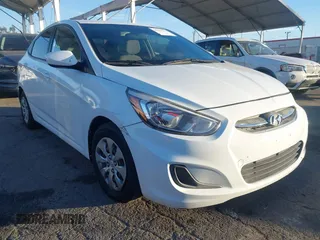 2016 Hyundai Accent SE z VIN KMHCT4AE0GU062891, wystawiony jako IAAI lot #40989721 z przebiegiem 128 457 mil mil oraz . Historia ofert i sprzedaży dostępna na DreamBid. Obrazek 1.