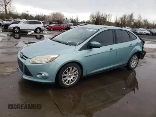 2012 Ford Focus SE with VIN 1FAHP3F21CL142407, listed as a Copart auction lot 48551205 with 174,935 mi miles and Salvage Title. Bid and sale history available at carsss.com. Image 1.