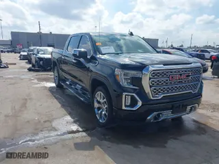 2021 GMC Sierra 1500 Denali with VIN 3GTP8FED0MG191202, listed as a IAAI auction lot 41484053 with 57,950 mi miles. Bid and sale history available at carsss.com. Image 1.