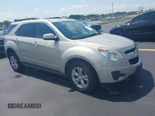 2015 Chevrolet Equinox LT z VIN 2GNALBEK4F6296410, wystawiony jako IAAI lot #42325053 z przebiegiem 115 012 mil mil oraz . Historia ofert i sprzedaży dostępna na DreamBid. Obrazek 1.