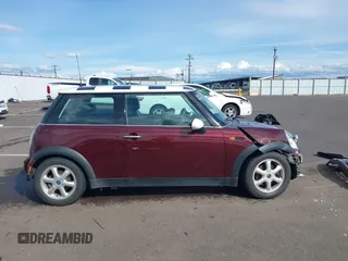 2003 MINI Hardtop with VIN WMWRC33493TC45557, listed as a IAAI auction lot 41868476 with 114,848 mi miles and . Bid and sale history available at DreamBid. Image 14.