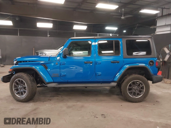 2021 Jeep Wrangler Unlimited Sport S with VIN 1C4HJXDN5MW717673, listed as a IAAI auction lot 42210527 with 35,635 mi miles and . Bid and sale history available at DreamBid. Image 14.