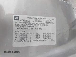 2007 Chevrolet Tahoe LT z VIN 1GNFK13077J372162, wystawiony jako IAAI lot #42656552 z przebiegiem 218 352 mil mil oraz . Historia ofert i sprzedaży dostępna na DreamBid. Obrazek 9.