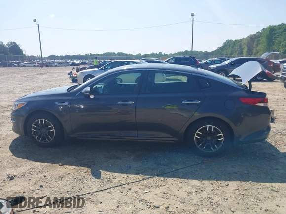 2018 Kia Optima LX z VIN KNAGT4L34J5232346, wystawiony jako IAAI lot #42136524 z przebiegiem 119 977 mil mil oraz . Historia ofert i sprzedaży dostępna na DreamBid. Obrazek 14.