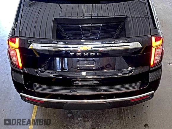 2022 Chevrolet Tahoe LS z VIN 1GNSKMKD7NR129745, wystawiony jako IAAI lot #42566236 z przebiegiem 95 126 mil mil oraz . Historia ofert i sprzedaży dostępna na DreamBid. Obrazek 10.