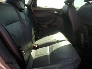2015 Ford Focus SE z VIN 1FADP3F25FL283595, wystawiony jako Copart lot #57966705 z przebiegiem 182 405 mil mil oraz Szkoda całkowita • Salvage title. Historia ofert i sprzedaży dostępna na DreamBid. Obrazek 10.