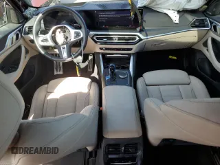 2022 BMW i4 eDrive40 with VIN WBY73AW05NFN05084, listed as a Copart auction lot 50677374 with 30,609 mi miles. Bid and sale history available at carsss.com. Image 8.