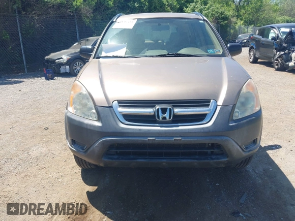 2004 Honda CR-V LX with VIN JHLRD68444C015503, listed as a IAAI auction lot 42145422 with 189,975 mi miles and . Bid and sale history available at carsss.com. Image 6.