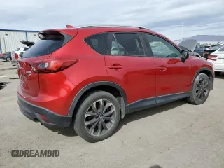 2016 Mazda CX-5 Grand Touring with VIN JM3KE4DY0G0820954, listed as a Copart auction lot 48027785 with 152,448 mi miles and Salvage Title. Bid and sale history available at carsss.com. Image 3.