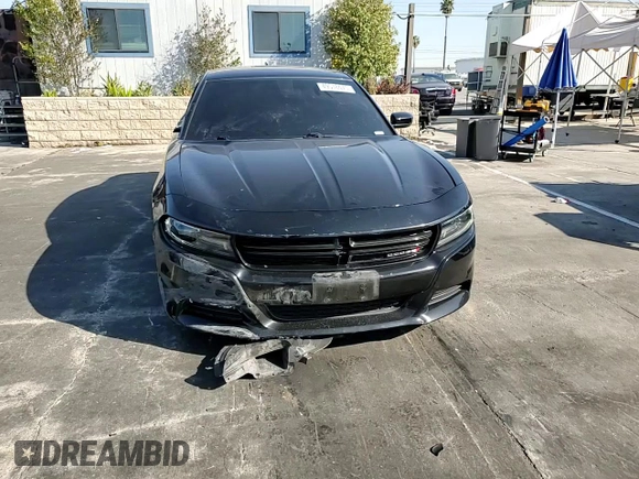 2019 Dodge Charger SXT with VIN 2C3CDXJG8KH757818, listed as a Copart auction lot 49518475 with 98,129 mi miles and Salvage Title. Bid and sale history available at DreamBid. Image 11.