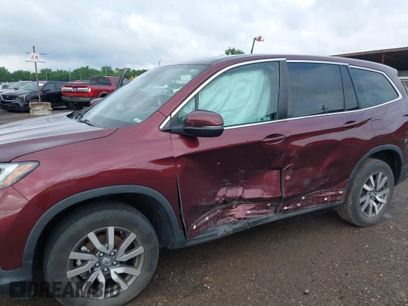 2021 Honda Pilot EX-L with VIN 5FNYF6H53MB094015, listed as a IAAI auction lot 42545722 with 66,065 mi miles and . Bid and sale history available at DreamBid. Image 6.