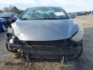 2012 Hyundai Elantra Limited with VIN KMHDH4AE9CU433241, listed as a IAAI auction lot 41834749 with 223,033 mi miles. Bid and sale history available at carsss.com. Image 13.