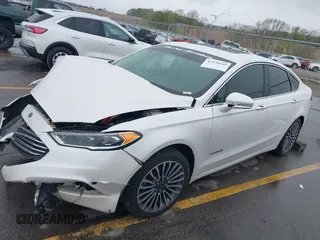 2017 Ford Fusion Hybrid Titanium с VIN 3FA6P0RUXHR317572, выставлен на аукционе IAAI как лот 42170169 с пробегом 138 987 миль миль и . История ставок и продаж доступна на DreamBid. Изображение 17.