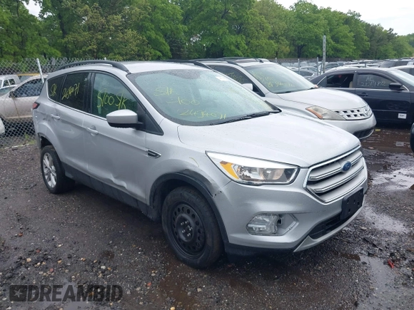 2018 Ford Escape SE with VIN 1FMCU9G99JUC41605, listed as a IAAI auction lot 39500946 with 114,032 mi miles. Bid and sale history available at carsss.com. Image 1.