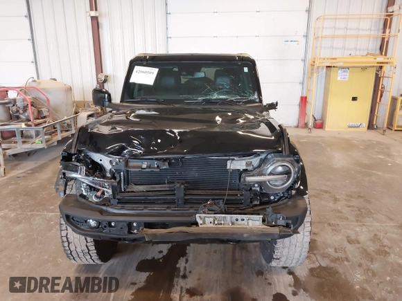 2022 Ford Bronco with VIN 1FMDE5DH0NLB06451, listed as a IAAI auction lot 42060509 with 55,624 mi miles and . Bid and sale history available at DreamBid. Image 6.