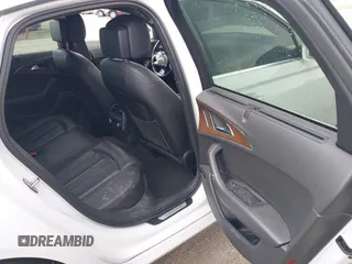 2014 Audi A6 Prestige z VIN WAUHMAFC6EN098487, wystawiony jako IAAI lot #41908034 z przebiegiem 146 298 mil mil oraz . Historia ofert i sprzedaży dostępna na DreamBid. Obrazek 8.