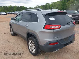 2015 Jeep Cherokee Limited with VIN 1C4PJMDS3FW706058, listed as a IAAI auction lot 41951302 with 163,404 mi miles. Bid and sale history available at carsss.com. Image 3.