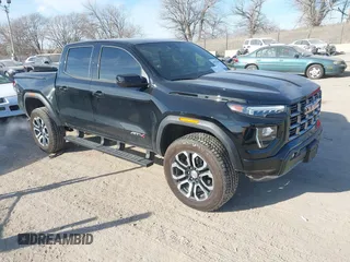 2024 GMC Canyon 4WD AT4 with VIN 1GTP6DEK9R1118926, listed as a IAAI auction lot 40998280 with 10,958 mi miles. Bid and sale history available at carsss.com. Image 1.