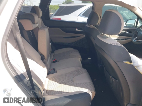 2019 Hyundai Santa Fe SE with VIN 5NMS23AD8KH051223, listed as a IAAI auction lot 42017754 with 146,704 mi miles and . Bid and sale history available at DreamBid. Image 8.